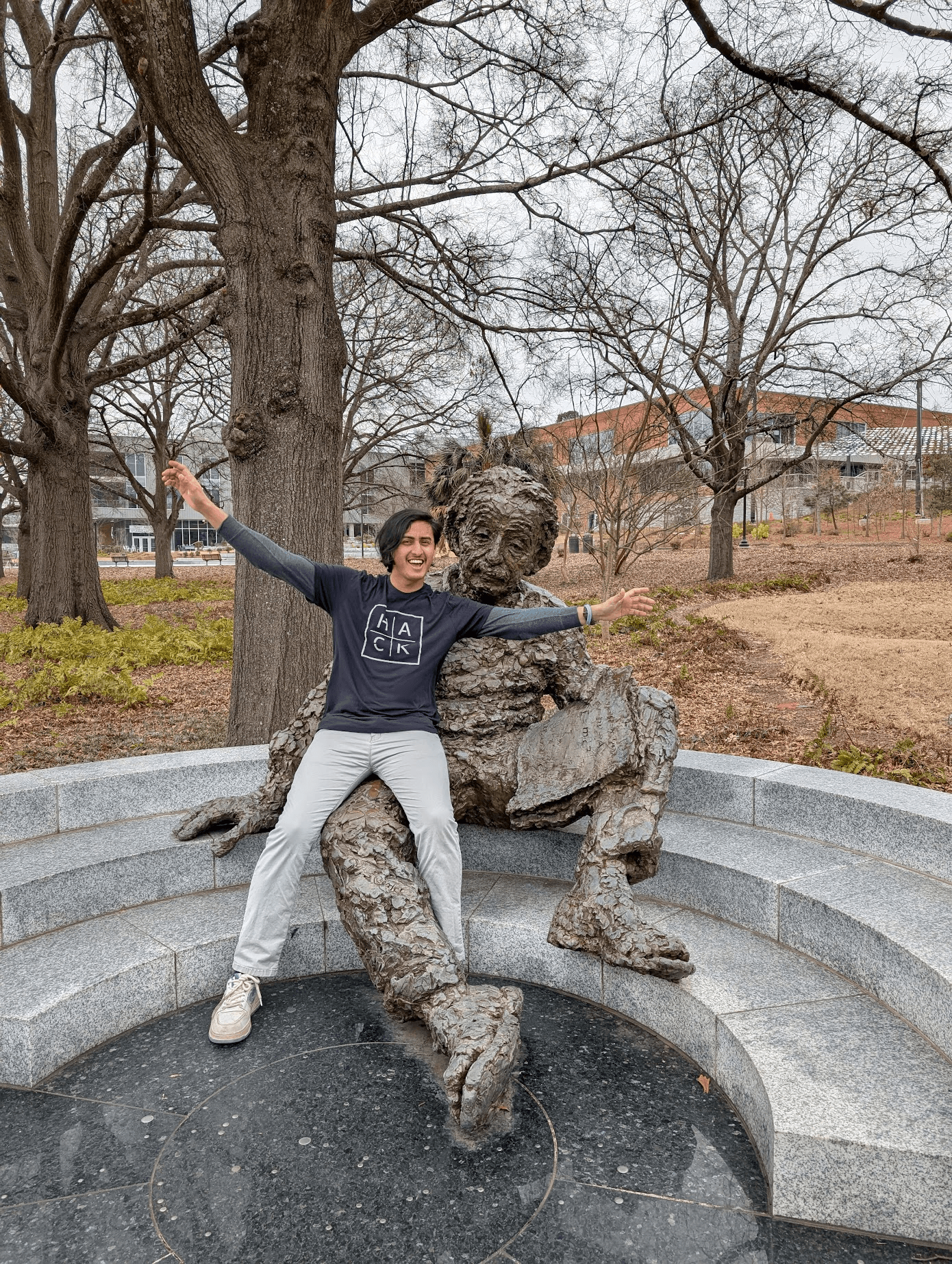 Diwash beside an Einstein statue during Hacklytics 2025 at Georgia Tech